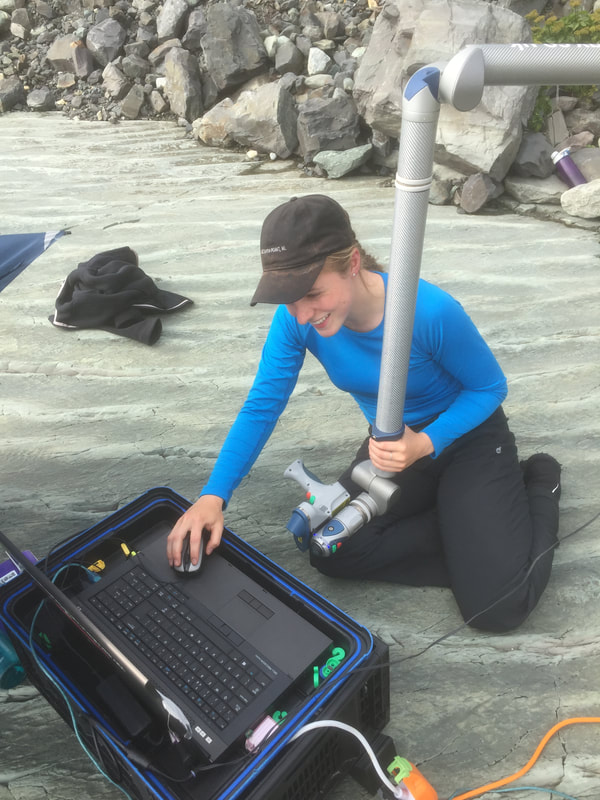 Catherine Clark laser-scanning Ediacaran fossils at Mistaken Point